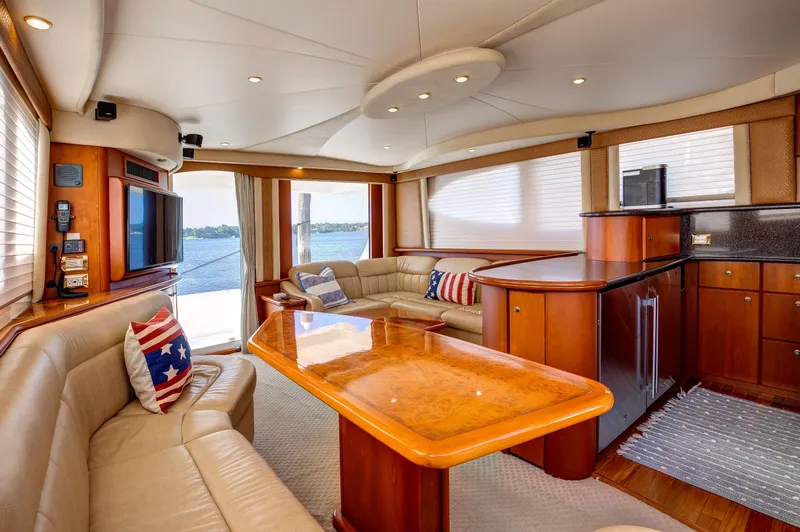  Yacht Photos Pics Luxurious interior of a 2006 Silverton 50 Convertible yacht with elegant seating and wood finishes.