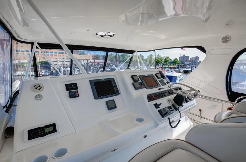  Yacht Photos Pics Interior helm of 2006 Silverton 50 Convertible yacht with navigation equipment.