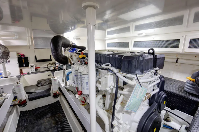  Yacht Photos Pics Engine room of 2006 Silverton 50 Convertible yacht, showcasing machinery and components.