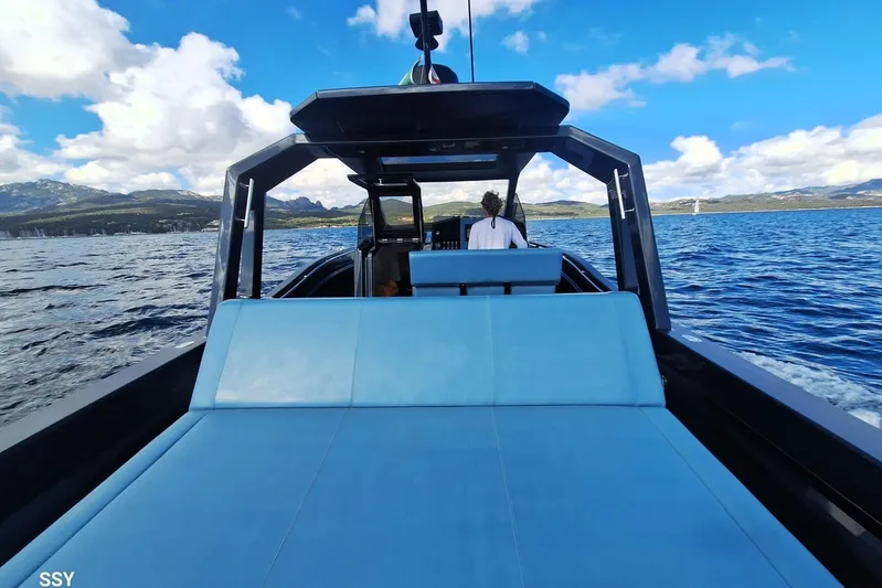 African Yacht Photos Pics 2017 Maori 50 T-Top boat cruising on a scenic blue ocean under a clear sky.