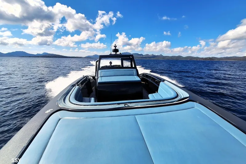 African Yacht Photos Pics 2017 Maori 50 T-Top yacht cruising on open sea under blue sky.