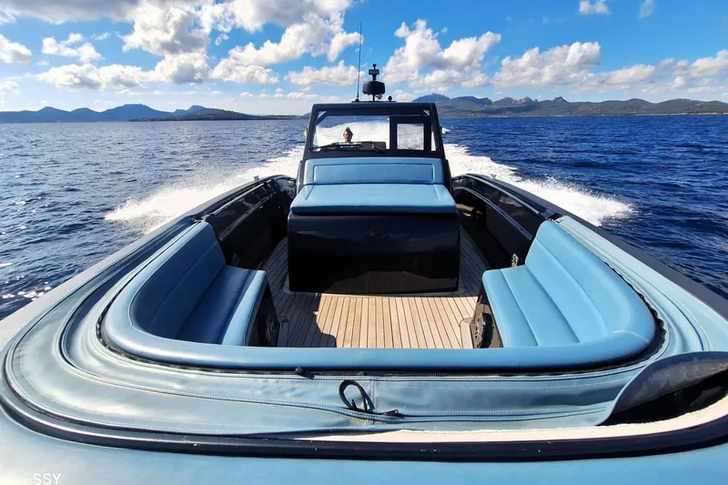 African Yacht Photos Pics 2017 Maori 50 T-Top boat cruising on open sea under blue sky.