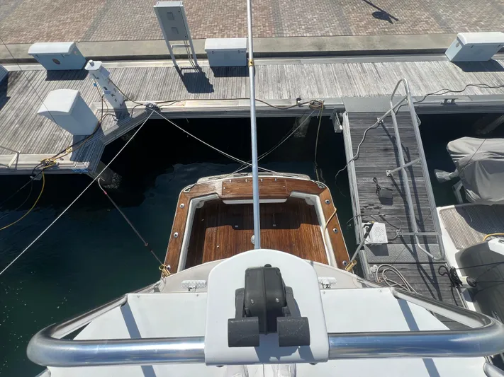  Yacht Photos Pics Aerial view of a 1997 Strike 42 boat docked at a marina.