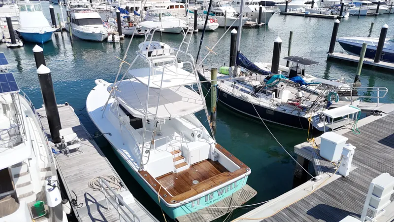 Yacht Photos Pics Aerial view of a 1997 Strike 42 boat docked at a marina.
