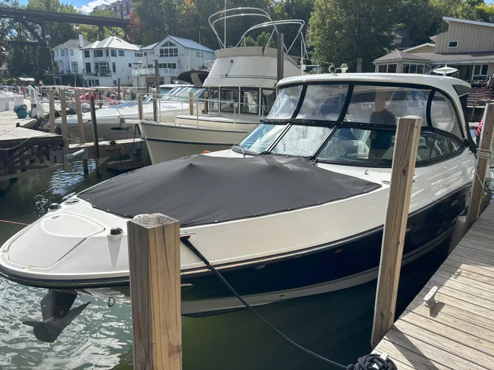  Yacht Photos Pics 2016 Sea Ray 350 SLX boat docked at marina, covered and ready for use.