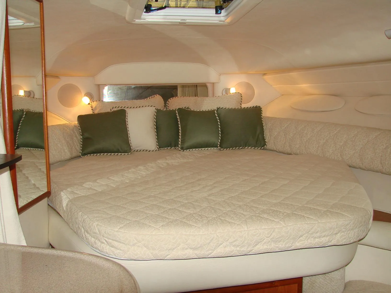 Interior of 2001 Sea Ray 340 Sundancer with cozy bed.