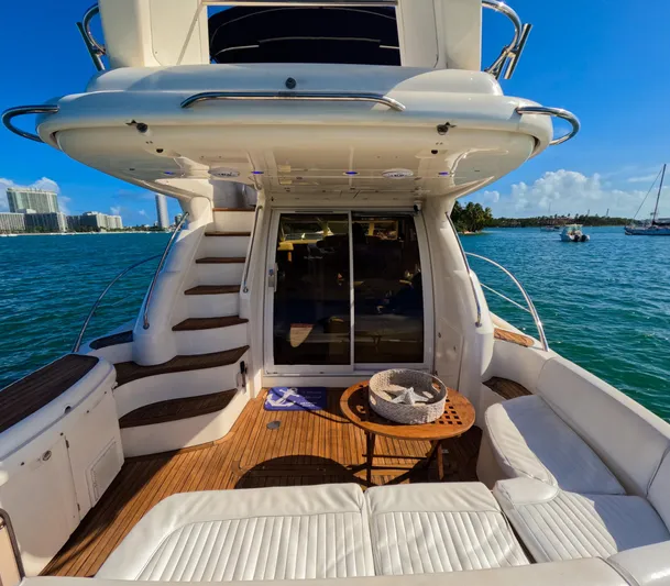 Seafari Yacht Photos Pics Luxury 2004 Sealine 47 yacht with spacious deck and scenic ocean view.