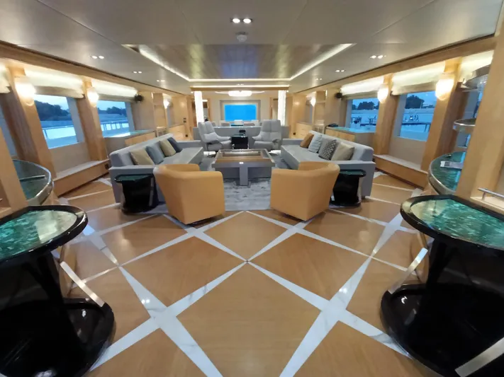 Sehamia Yacht Photos Pics Luxurious interior of 2018 Gulf Craft Majesty 155 yacht with elegant seating and modern design.