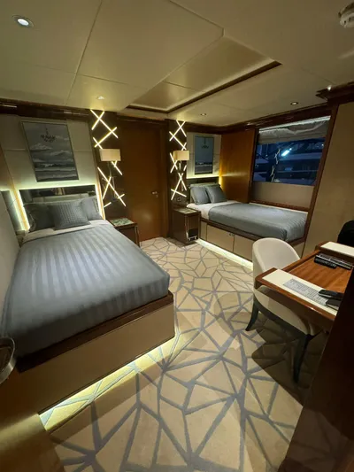 Sehamia Yacht Photos Pics Luxurious cabin interior of 2018 Gulf Craft Majesty 155 yacht with twin beds and modern decor.