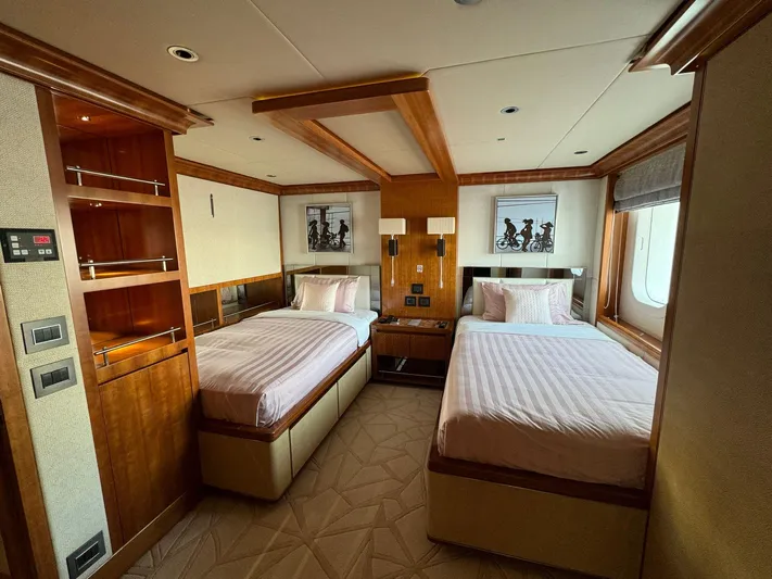 Sehamia Yacht Photos Pics Luxurious twin bedroom on 2018 Gulf Craft Majesty 155 yacht, featuring elegant wood finishes.