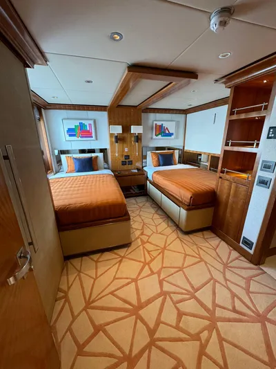 Sehamia Yacht Photos Pics Luxurious twin bedroom on 2018 Gulf Craft Majesty 155 yacht, featuring elegant decor and modern amenities.