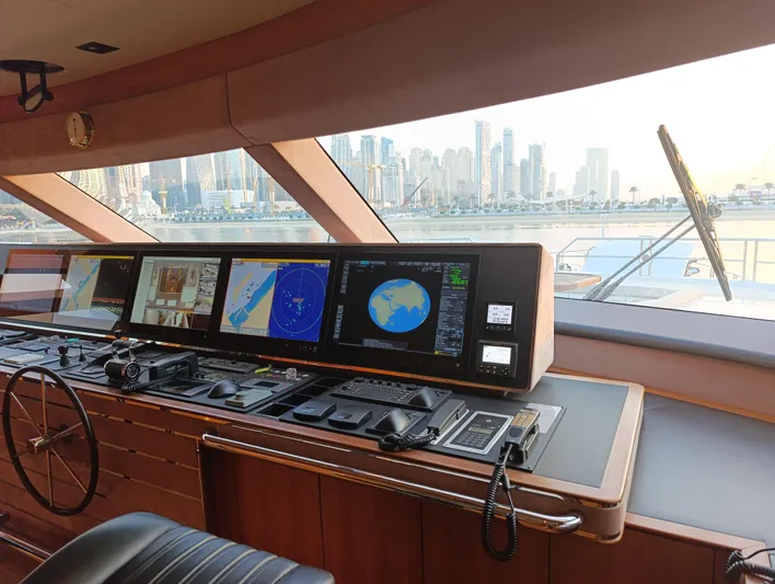 Sehamia Yacht Photos Pics Control room of 2018 Gulf Craft Majesty 155 yacht with city skyline view.
