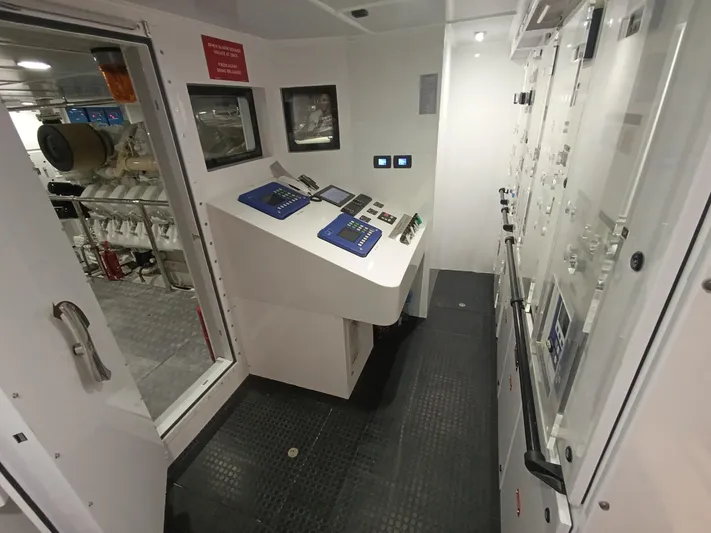 Sehamia Yacht Photos Pics Engine control room of 2018 Gulf Craft Majesty 155 yacht, featuring advanced control panels.