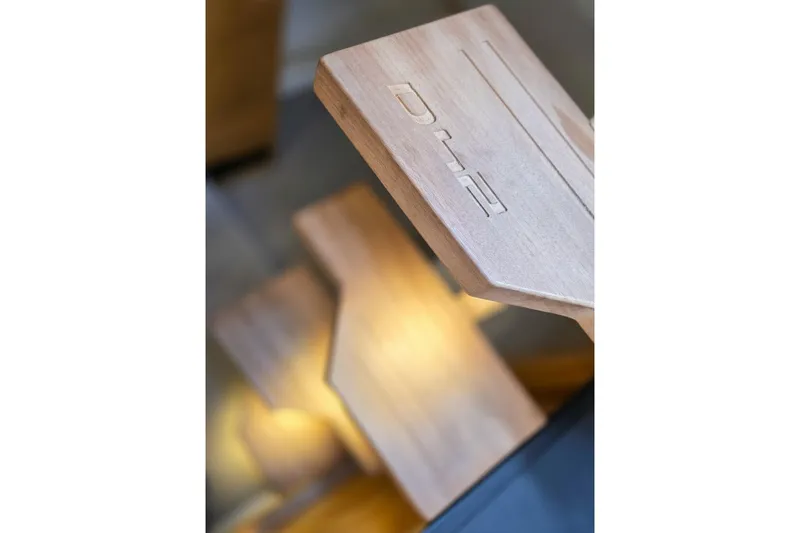 Never Enough Yacht Photos Pics Close-up of wooden steps on 2023 De Antonio Yachts D42 Open.