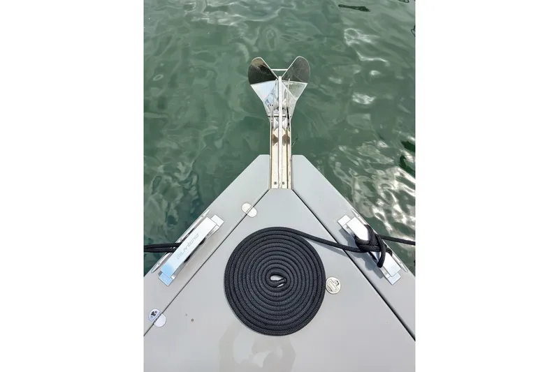 Never Enough Yacht Photos Pics Bow of 2023 De Antonio Yachts D42 Open with anchor and coiled rope.