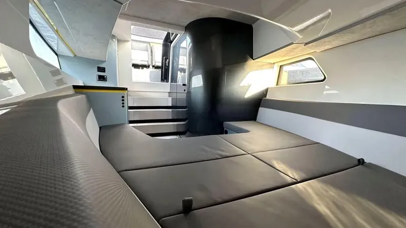  Yacht Photos Pics Luxurious interior of 2024 Maori 46ft yacht with modern seating and sleek design.