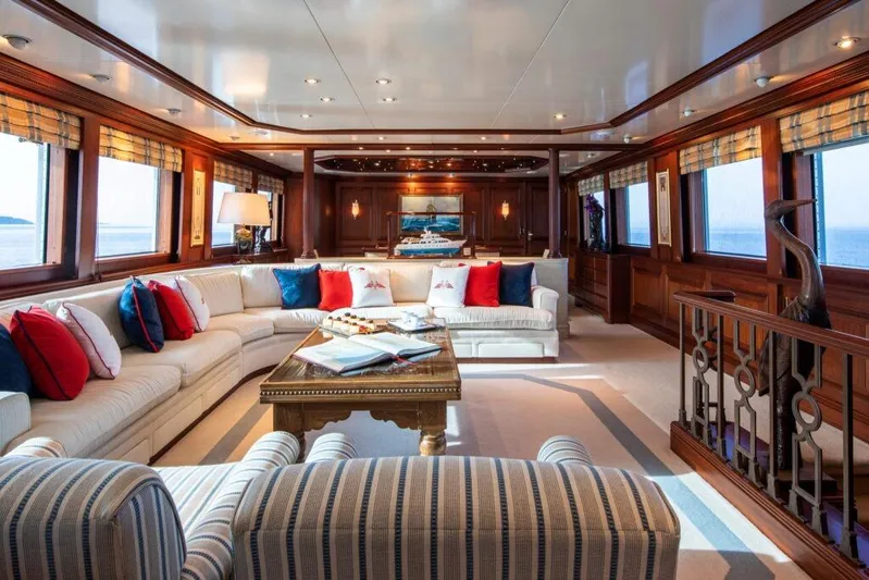  Yacht Photos Pics Luxurious interior of 1982 Feadship Classic yacht with elegant seating and ocean views.