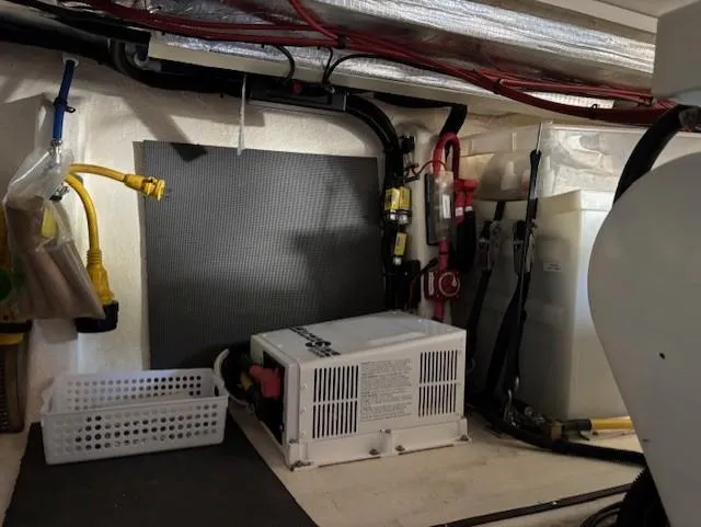 Island Dreamer Yacht Photos Pics 1999 Riviera Convertible engine room with electrical components and wiring.