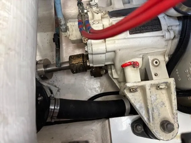 Island Dreamer Yacht Photos Pics Engine compartment of a 1999 Riviera Convertible, showcasing mechanical components and wiring.