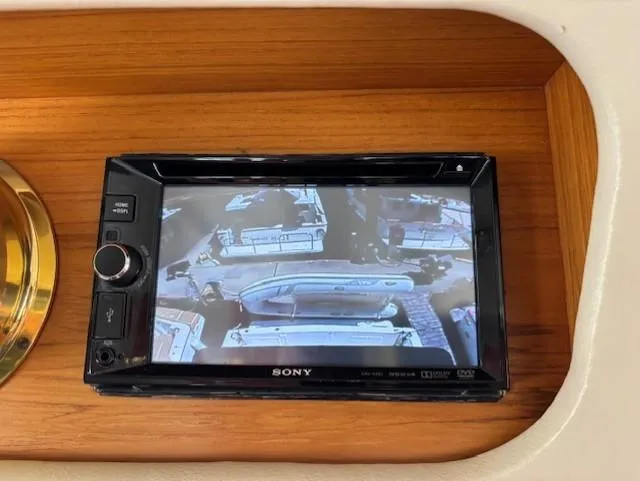 Island Dreamer Yacht Photos Pics Sony display in 1999 Riviera Convertible showing a boat view.