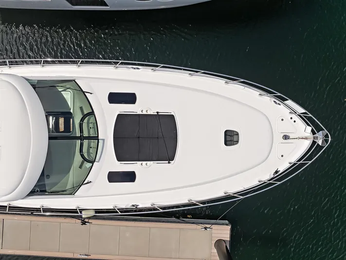  Yacht Photos Pics Top view of a 2006 Sea Ray 60 Sundancer yacht docked at a marina.