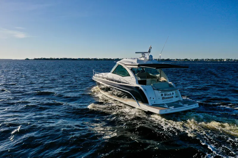  Yacht Photos Pics 2016 Formula 45 Yacht cruising on open water under clear blue sky.