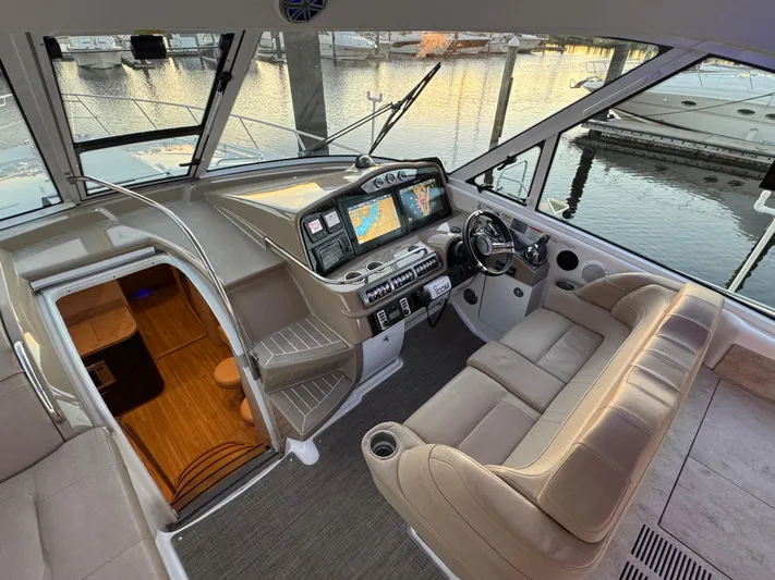  Yacht Photos Pics Interior of 2016 Formula 45 Yacht with modern navigation system and plush seating.