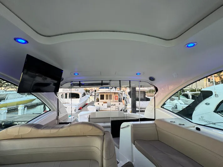  Yacht Photos Pics Interior of 2016 Formula 45 Yacht with modern seating and dock view.