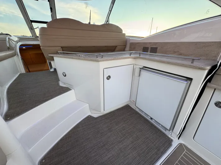  Yacht Photos Pics 2016 Formula 45 Yacht interior with kitchenette and seating area.