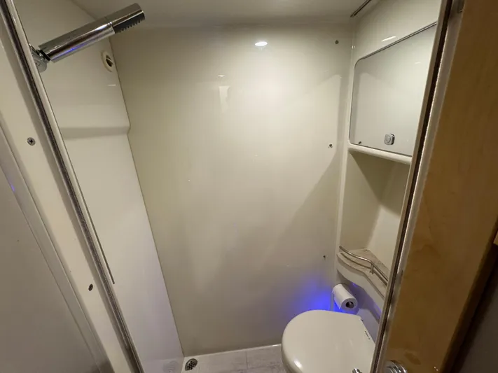  Yacht Photos Pics Bathroom interior of 2016 Formula 45 Yacht, featuring modern fixtures and compact design.