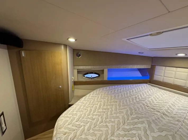  Yacht Photos Pics Luxurious interior of 2016 Formula 45 Yacht with cozy bed and ambient lighting.