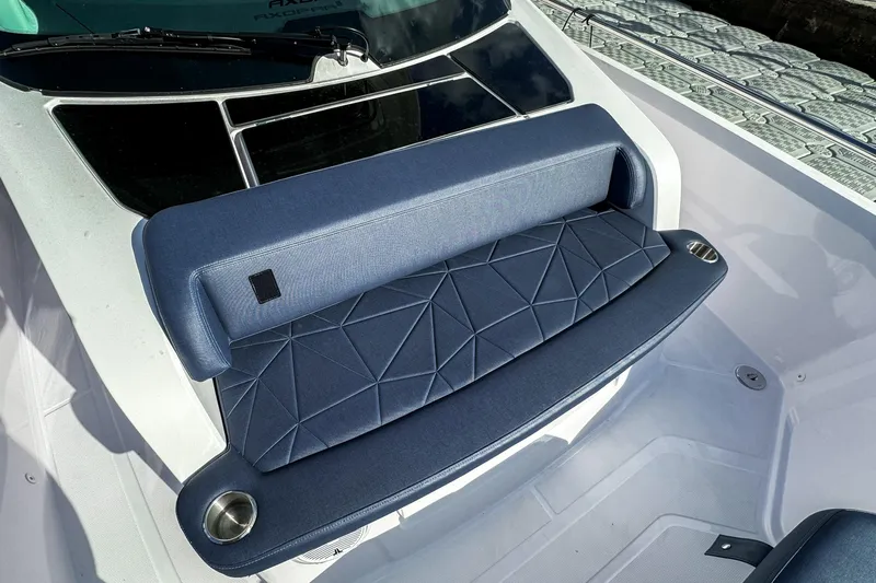  Yacht Photos Pics 2026 Axopar 29 Sun Top boat seat with geometric design and cup holders.