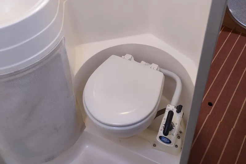 Nyango Yacht Photos Pics Marine toilet in 1996 Fountaine Pajot Venezia 42 catamaran bathroom.