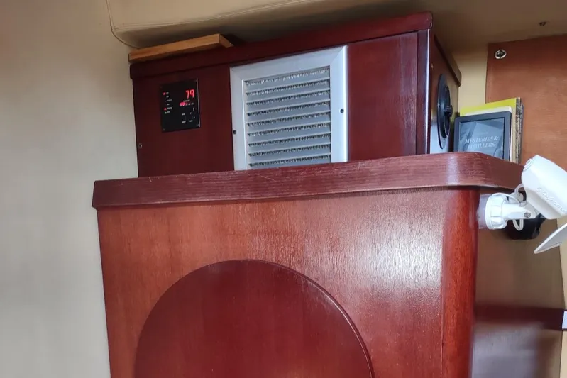 Nyango Yacht Photos Pics Wooden interior of 1996 Fountaine Pajot Venezia 42 with electronic device.