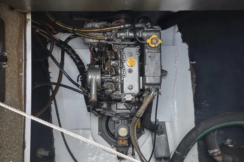 Nyango Yacht Photos Pics Engine compartment of a 1996 Fountaine Pajot Venezia 42 catamaran, showcasing mechanical components.