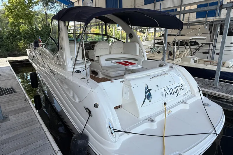 Magpie Yacht Photos Pics 2006 Sea Ray 340 Sundancer docked, featuring a spacious deck and canopy.