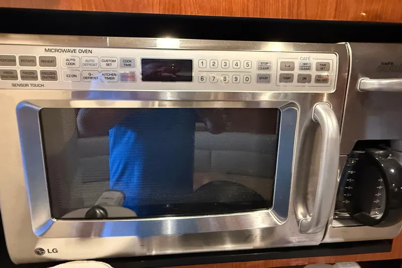 Magpie Yacht Photos Pics LG microwave oven inside a 2006 Sea Ray 340 Sundancer boat kitchen.