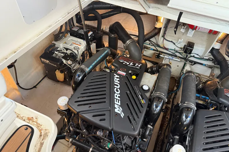 Magpie Yacht Photos Pics Engine room of 2006 Sea Ray 340 Sundancer with Mercury engines and Kohler power system.