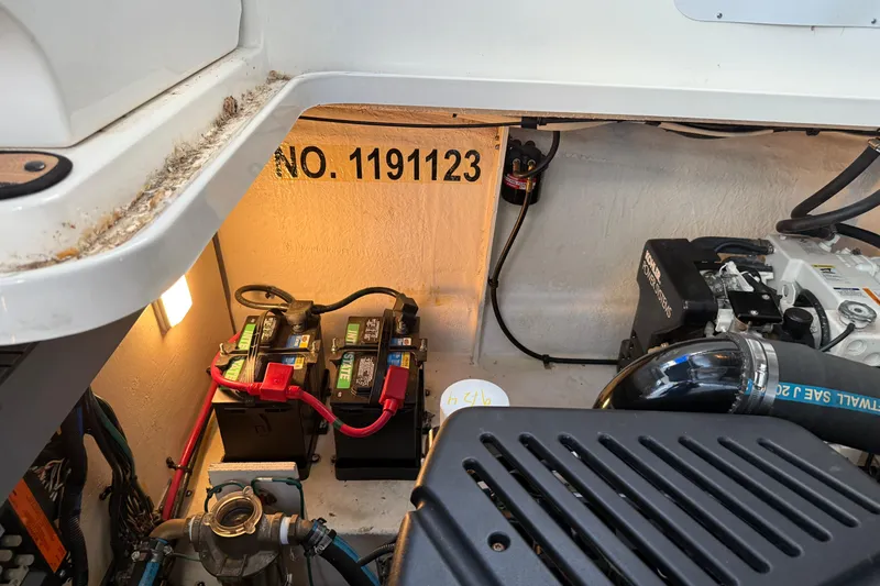 Magpie Yacht Photos Pics Engine compartment of 2006 Sea Ray 340 Sundancer with batteries and wiring.