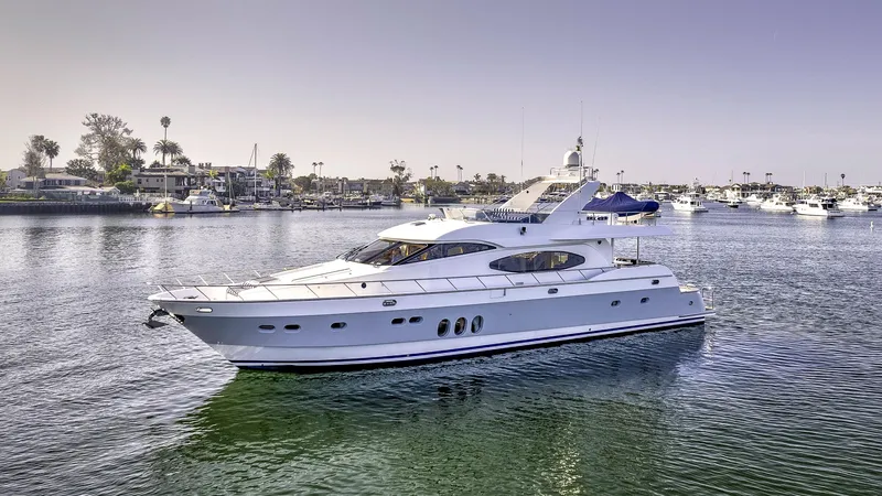 Bora Bora Yacht Photos Pics Luxurious 2009 Paragon MK yacht cruising in a serene harbor setting.