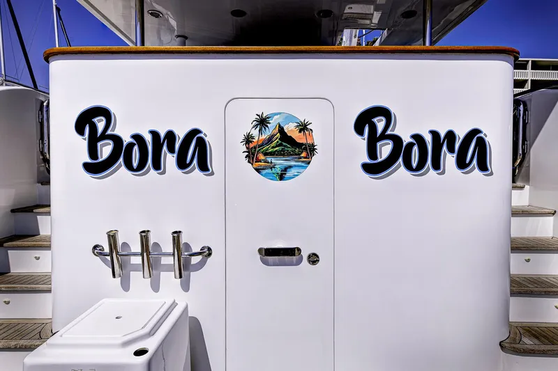 Bora Bora Yacht Photos Pics Paragon mk 2009 boat with 'Bora Bora' text and tropical island graphic on the door.
