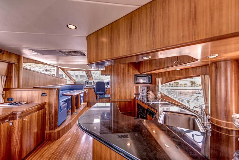 Bora Bora Yacht Photos Pics Luxurious 2009 Paragon mk yacht interior with wood finish and modern amenities.