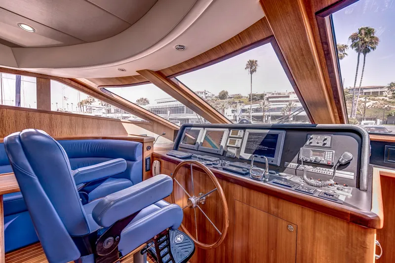 Bora Bora Yacht Photos Pics Luxurious 2009 Paragon mk yacht interior with blue seating and advanced navigation controls.