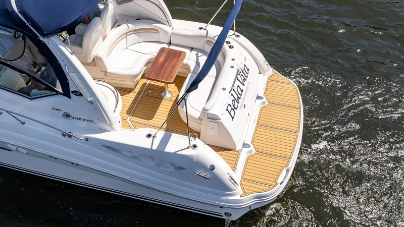 Bella Vita Yacht Photos Pics 2008 Sea Ray 340 Sundancer yacht with teak deck, cruising on water.