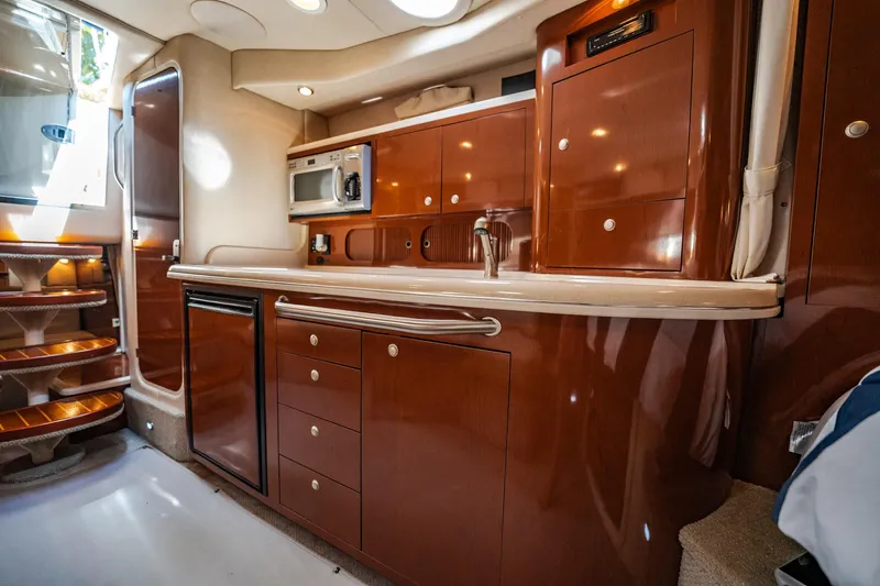 Bella Vita Yacht Photos Pics Luxurious 2008 Sea Ray 340 Sundancer yacht interior with modern kitchen amenities.