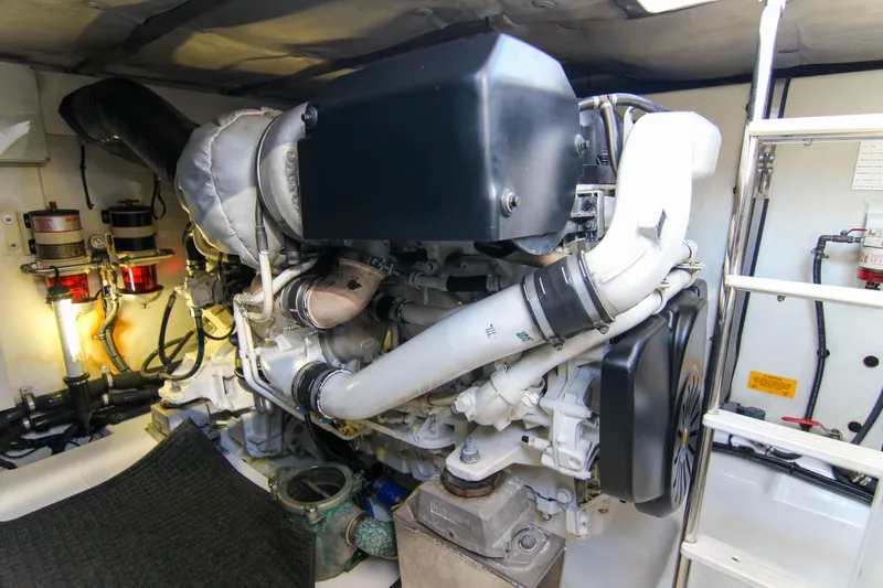 Fortunato Yacht Photos Pics Engine room of 2016 Azimut 50 Flybridge yacht, showcasing mechanical components and systems.