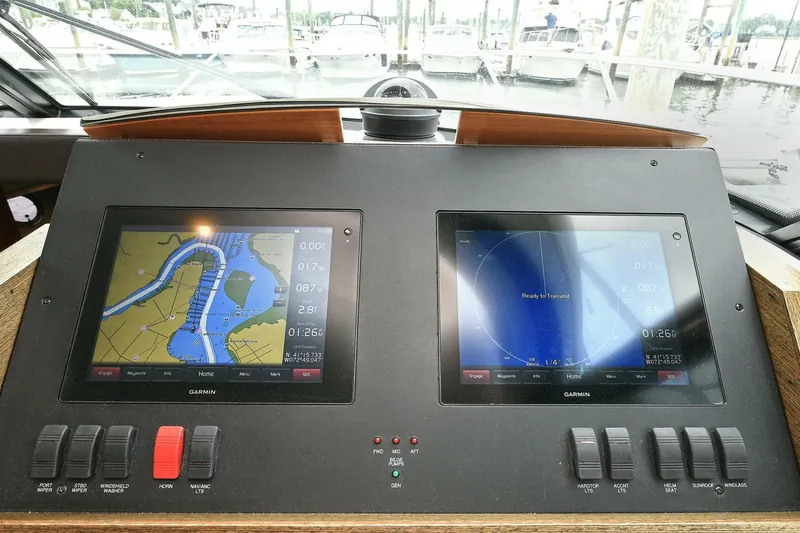  Yacht Photos Pics Helm of 2015 Tiara Yachts C44 Coupe with dual Garmin navigation displays.