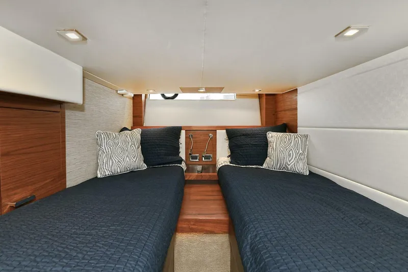  Yacht Photos Pics Interior of 2015 Tiara Yachts C44 Coupe with twin beds and modern design.