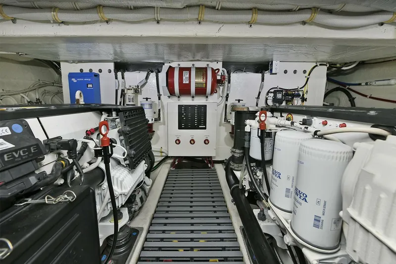  Yacht Photos Pics Engine room of 2015 Tiara Yachts C44 Coupe, showcasing mechanical components and systems.