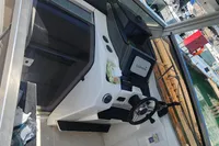 2022 Karnic CS 700HT boat cockpit with Garmin navigation system at marina.